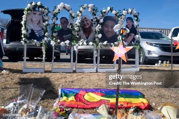 Images of the victims killed in the Club Q shooting are placed along a memorial near Club Q in Colorado Springs, United States on Nov. 22, 2022.