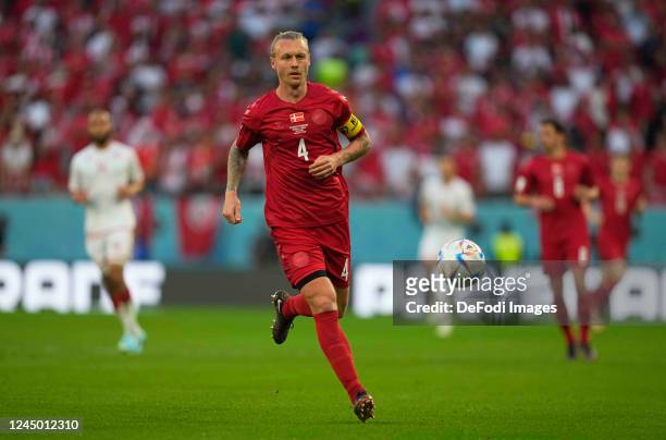 Simon Kjaer of Denmark controls the ball during the FIFA World Cup Qatar 2022 Group D match between Denmark and Tunisia at Education City Stadium on...