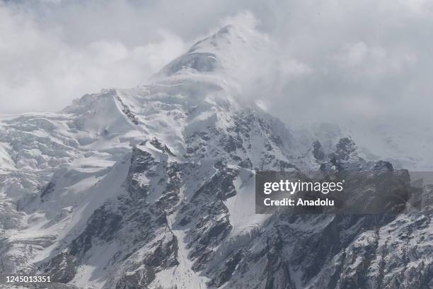 View of snow covered Nanga Parbat, which is the ninth-highest mountain in the world, named King of the Mountains by inhabitants and known as the...