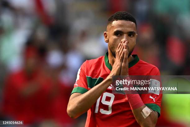 Morocco's forward Youssef En-Nesyri reacts to a missed chance during the Qatar 2022 World Cup Group F football match between Morocco and Croatia at...