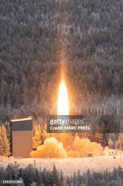 Picture taken on November 23, 2022 shows the launch of the "SubOrbital Express 3" suborbital rocket from the Esrange Space Center in Jukkasjärvi,...