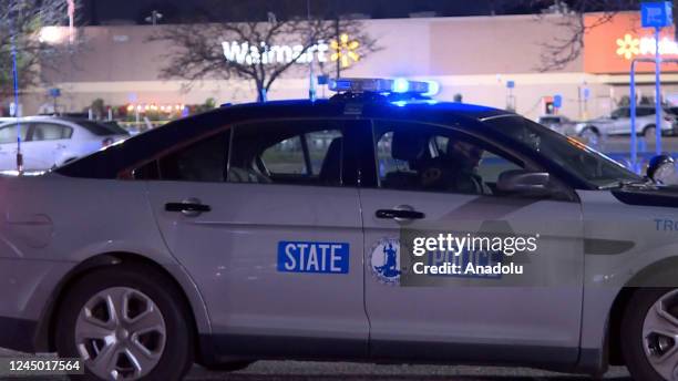 Screen grab from a video shows a police car after at least 10 people were killed in a gun attack at a supermarket in Virginia, USA on November 23,...