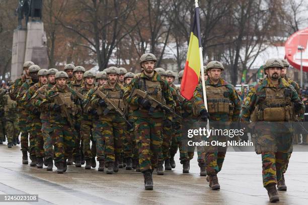 Members of Belgium army and soldiers from different NATO countries attend a military parade ceremony marking the 104th anniversary of the Lithuanian...