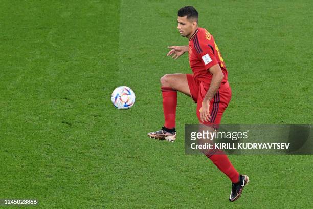 Spain's midfielder Rodri controls the ball during the Qatar 2022 World Cup Group E football match between Spain and Costa Rica at the Al-Thumama...