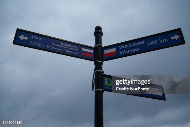 Roadsign is seen near the three country border point, where the borders of Lithuania, Poland and the Russian exclave of Kaliningrad intersect near...