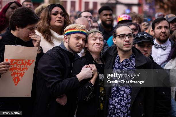 Mourners outside of the Colorado Springs City Hall where a rainbow flag was draped over the building on November 23, 2022 in Colorado Springs,...