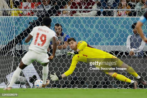 Thibaut Courtois of Belgium stopped the penalty from Alphonso Davies of Canada during the World Cup match between Belgium v Canada at the Ahmad Bin...