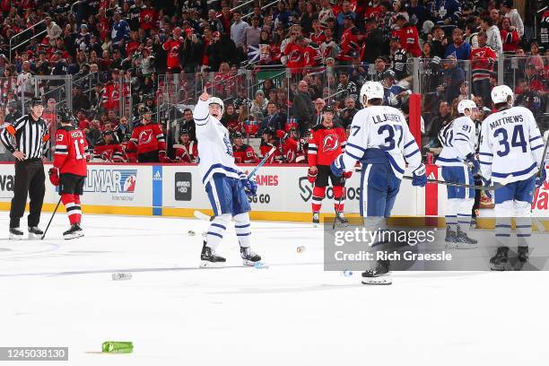 Mitchell Marner of the Toronto Maple Leafs towards the crowd during the third period of the game against the New Jersey Devils on November 23, 2022...