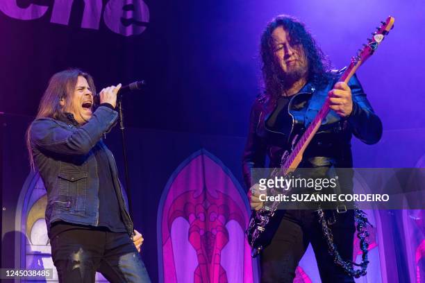 Singer Todd La Torre and US guitarist Michael Wilton of heavy metal band Queensryche perform onstage at Tech Port Arena on November 23, 2022 in San...