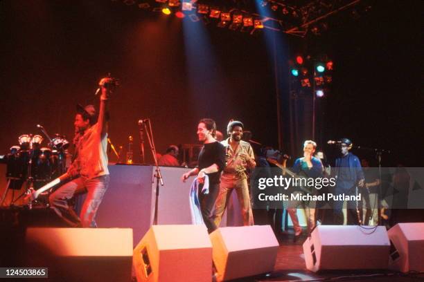 Perform on stage, London, September 1980, L-R Earl Falconer, Robin Campbell, Ali Campbell.