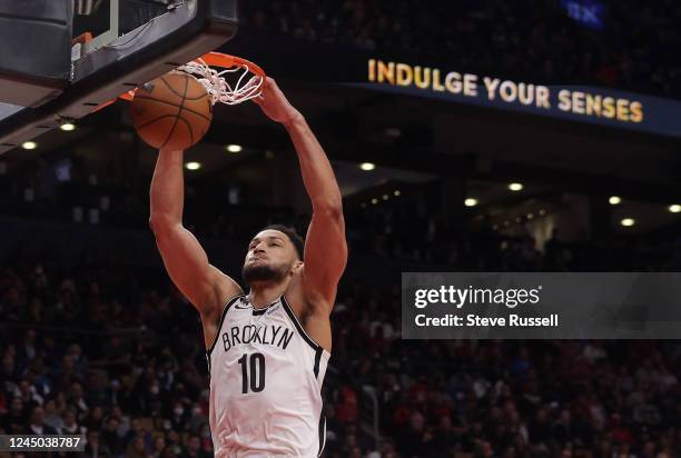 Brooklyn Nets guard Ben Simmons dunks as the Toronto Raptors fall to the Brooklyn Nets at Scotiabank Arena in Toronto, November 23, 2022.