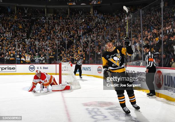 Evgeni Malkin of the Pittsburgh Penguins celebrates his game winning shootout goal against the Calgary Flames at PPG PAINTS Arena on November 23,...