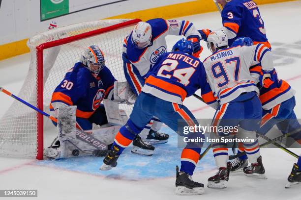Edmonton Oilers Right Wing Zach Hyman takes a shot on New York Islanders Goalie Ilya Sorokin during the second period of the National Hockey League...