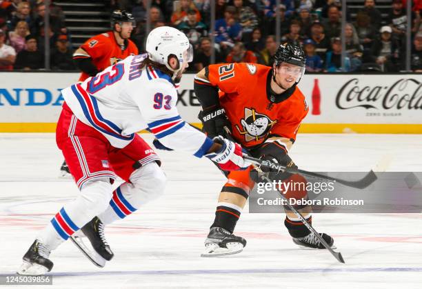 Mika Zibanejad of the New York Rangers and Isac Lundestrom of the Anaheim Ducks battle for position during the third period at Honda Center on...