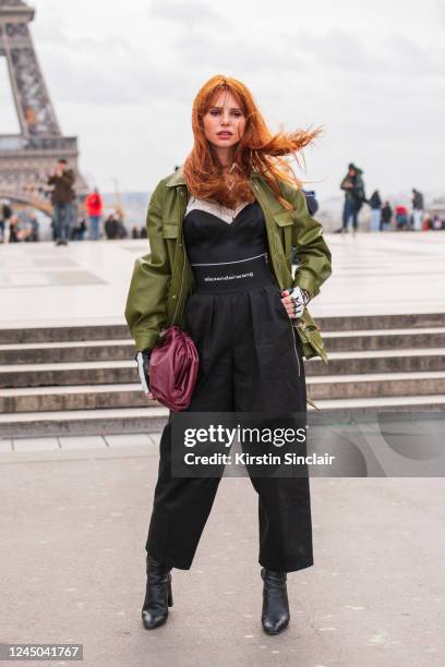 Digital influencer and model Evelyn Kazantzoglou wears a Bottega Veneta bag, Alexander Wang jumpsuit, H&M jacket and Zara boots on February 29, 2020...