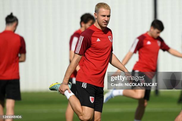 Wales' midfielder Aaron Ramsey takes part in a training session at Al Sadd SC in Doha on November 24 on the eve of the Qatar 2022 World Cup football...