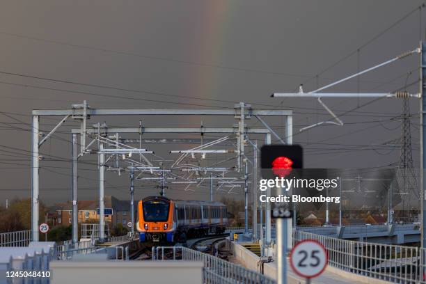 Train enters the Barking Riverside overground station beneath a rainbow in London, UK, on Wednesday, Nov. 23, 2022. Barking and Dagenham is the only...