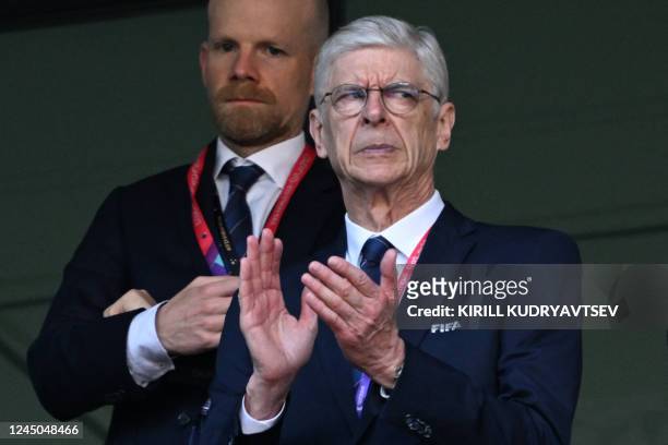 S Chief of Global Football Development Arsene Wenger applauds ahead of the Qatar 2022 World Cup Group G football match between Switzerland and...