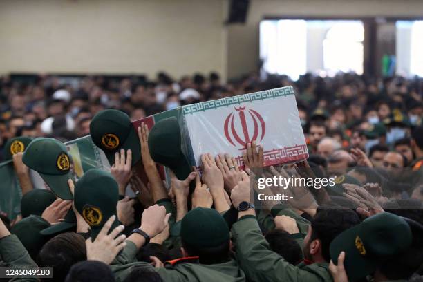 Members of Iran's Islamic Revolutionary Guard Corps, friends and family attend the funeral of Colonel Davoud Jafari, the Iranian capital Tehran, on...