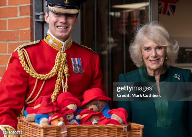 Camilla, Queen Consort, arrives at Barnardo's in a convoy of electric taxis which will transport Paddington teddy bears from Clarence House and...