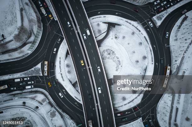 Traffic, cars are seen on a roundabout in Warsaw, Poland on 24 November, 2022.