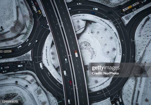 Traffic, cars are seen on a roundabout in Warsaw, Poland on 24 November, 2022.