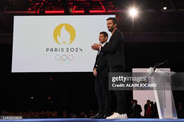 Mayor of Cannes and president of the "France's Mayors' Association" David Lisnard and French President of the Paris Organising Committee of the 2024...