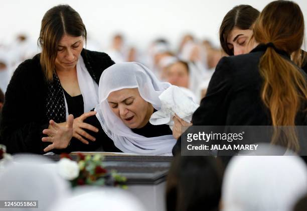 An Israeli Druze woman reacts in front of the body of 17-year-old Tiran Fero, on November 24 during his funeral ceremony in Daliyat al Karmel, around...