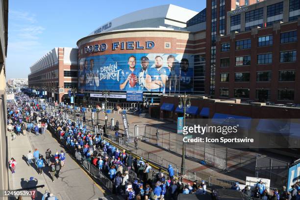 Fans line up outside of Ford Field waiting for the doors to open before the start of a regular season NFL football game between the Buffalo Bills and...