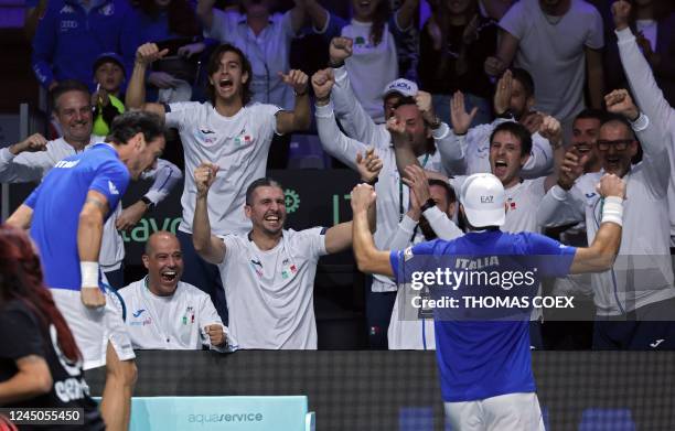 Italys Simone Bolelli and his teammate Italys Fabio Fognini celebrate their victory on US Tommy Paul and US Jack Sock at the end of the men's double...