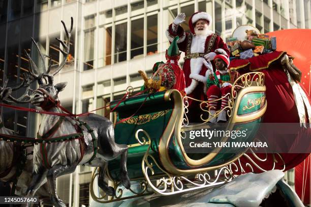 Santa Claus waves during the 96th Annual Macy's Thanksgiving Day Parade in New York City on November 24, 2022.