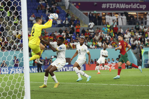 Portugal goalkeeper Diego Costa catches the ball under pressure from Inaki Williams of Ghana during the FIFA World Cup Qatar 2022 Group H match...
