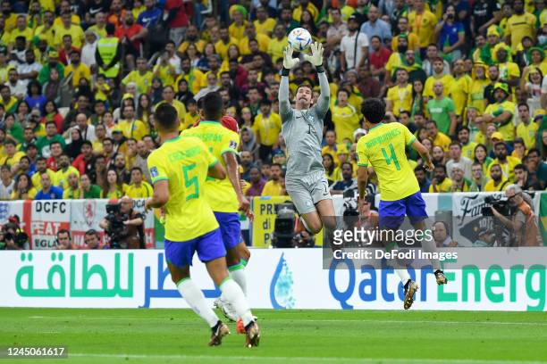 Goalkeeper Alisson of Brazil controls the ball during the FIFA World Cup Qatar 2022 Group G match between Brazil and Serbia at Lusail Stadium on...