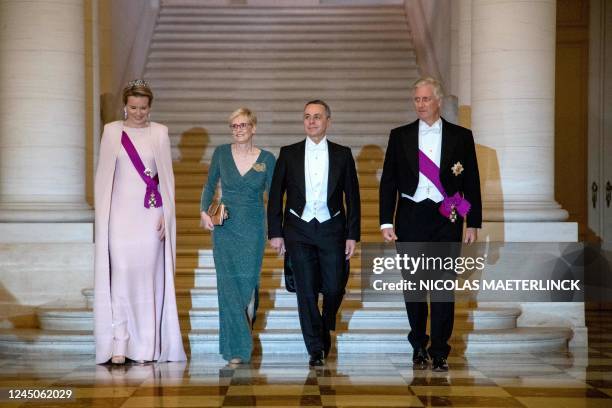 Queen Mathilde of Belgium , Switzerland's President Ignazio Cassis and his wife Paola Rodoni Cassis and King Philippe of Belgium attend a state...