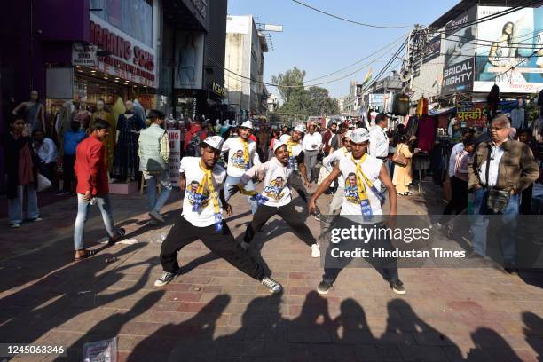 Artists perform in flash mob event campaigning for AAP for the MCD elections at Lajpat Nagar market on November 24, 2022 in New Delhi, India. Delhi...