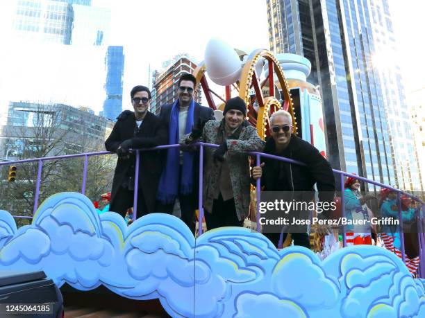 Logan Henderson, James Maslow, Kendall Schmidt and Carlos PenaVega of 'Big Time Rush' are seen at the 2022 Macy's Thanksgiving Day Parade on November...