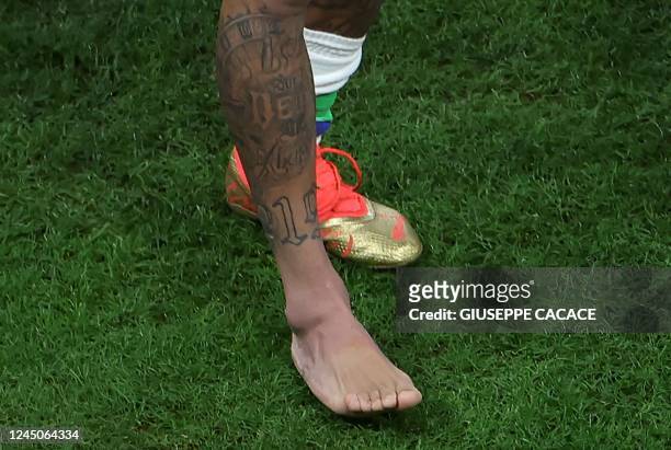 Picture of the swollen ankle of Brazil's forward Neymar taken as he leaves the field at the end of the Qatar 2022 World Cup Group G football match...