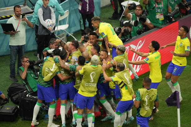 Players of Brazil celebrate after scoring a goal during the FIFA World Cup Qatar 2022 Group G match between Brazil and Serbia at Lusail Stadium in...