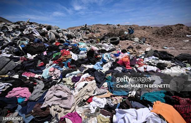View of piles of clothes dumped in the desert in La Pampa sector of Alto Hospicio, about 10 km east of the city of Iquique, Chile, on November 11,...