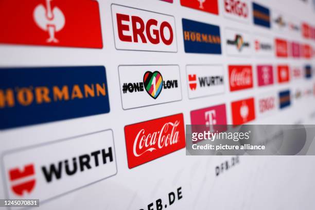November 2022, Qatar, Al-Shamal: Soccer, 2022 World Cup in Qatar, press conference, national team, Germany, the advertising board with sponsors in...