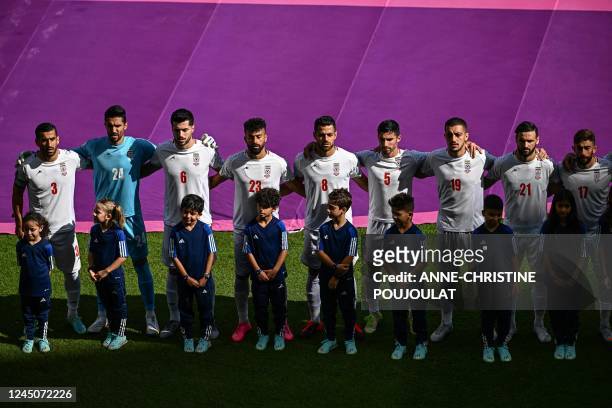Iran's defender Ehsan Hajsafi, Iran's goalkeeper Hossein Hosseini, Iran's midfielder Saeid Ezatolahi, Iran's defender Ramin Rezaeian, Iran's defender...