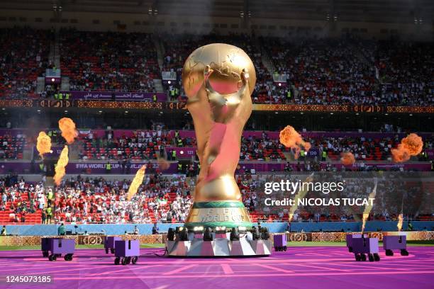 Giant replica of the World Cup trophy is pictured ahead of the Qatar 2022 World Cup Group B football match between Wales and Iran at the Ahmad Bin...