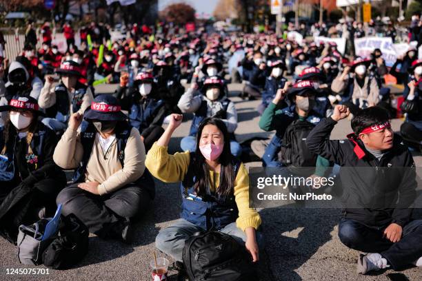 Hundreds of members of the Korean Confederation of Trade Unions' public transport union are shouting slogans during a General Strike of the National...
