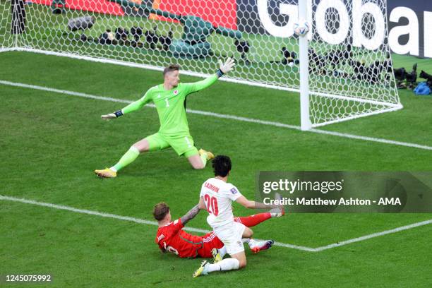 Wayne Hennessey of Wales looks on as Sardar Azmoun of Iran hits the post during the FIFA World Cup Qatar 2022 Group B match between Wales and IR Iran...