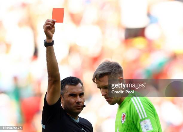 Wales' Wayne Hennessey is shown a red card by referee Mario Escobar during the FIFA World Cup Qatar 2022 Group B match between Wales and IR Iran at...
