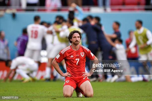 Joe Allen of Wales looks dejected after conceding his sides first goal from Roozbeh Cheshmi of IR Iran during the Group B - FIFA World Cup Qatar 2022...