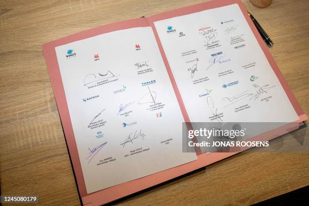 The signatures of all partners involved are seen at a press conference on the public signing of the second part of the Wings technology innovation...