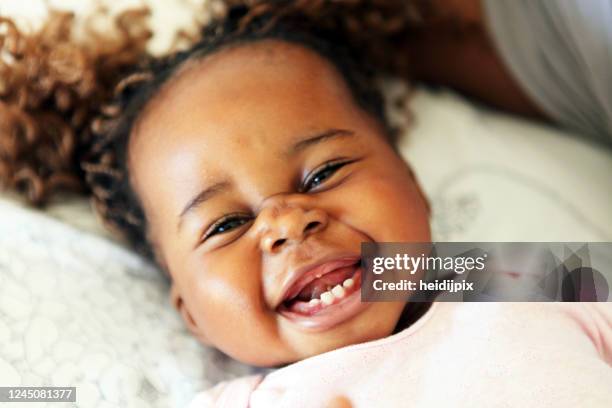 happiness - baby tooth stock pictures, royalty-free photos & images