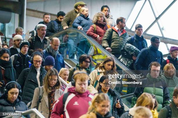 Commuters arrive at Leeds railway station in Leeds, UK, on Friday, Nov. 25, 2022. The Bank of England has delayed plans to move hundreds of staff...