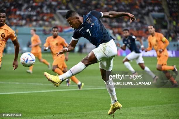 Ecuador's defender Pervis Estupinan kicks the ball during the Qatar 2022 World Cup Group A football match between the Netherlands and Ecuador at the...